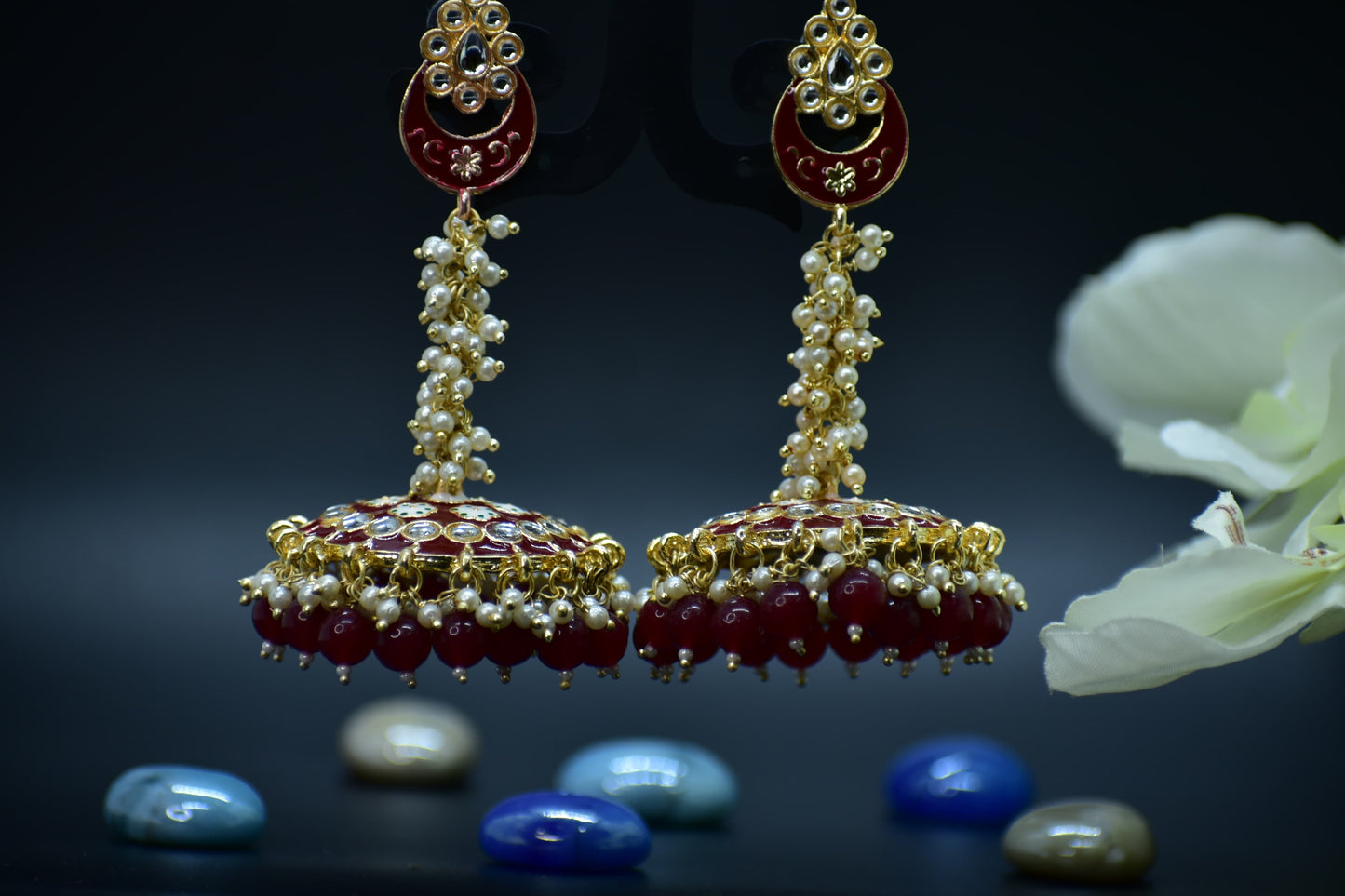 Ornate Polki gold and red earrings