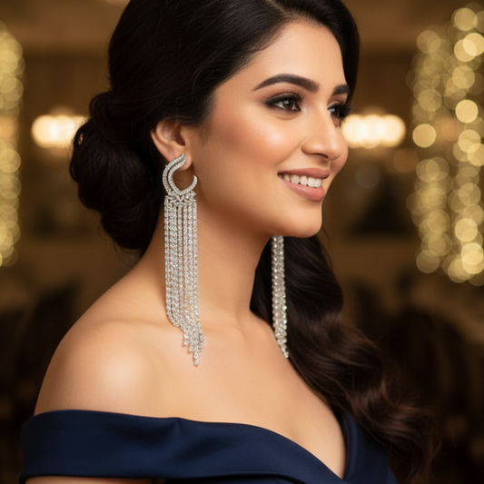 Woman wearing large, dangling earrings 