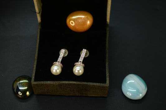 Ojasvi Silver Polish AD Designer Pearl Drop Earrings