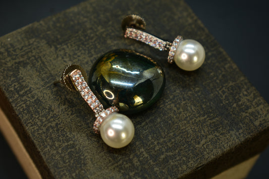 Ojasvi Silver Polish AD Designer Pearl Drop Earrings