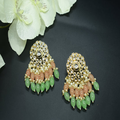 orange and green polki earrings