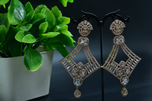 Jhanvi Diamond Shaped Silver Polish AD Designer Earrings