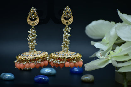 Polki Ornate gold earrings with coral beads with orange drops